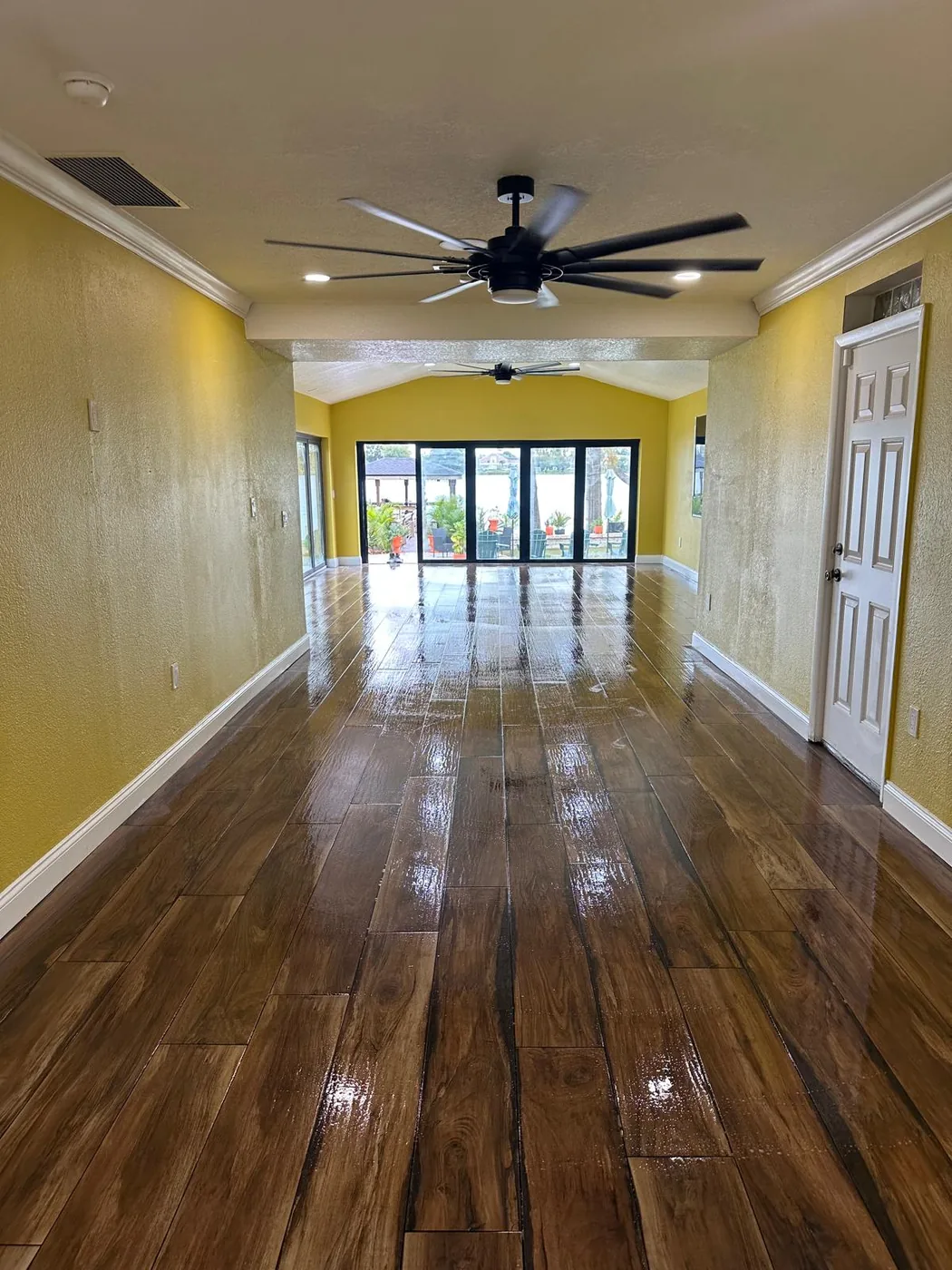 Living room after new wood-look tile flooring